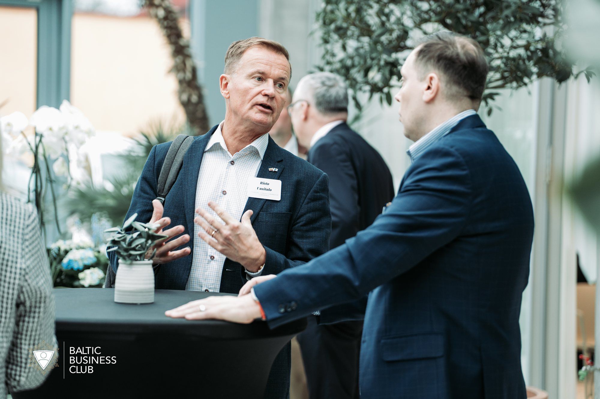 Participants talking during the reception